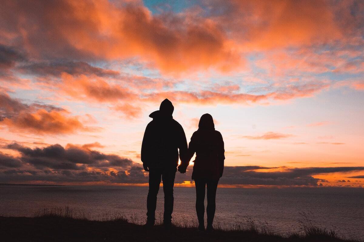 couple looking into sunset
