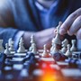 POV of a person playing chess. The opponent is moving their king