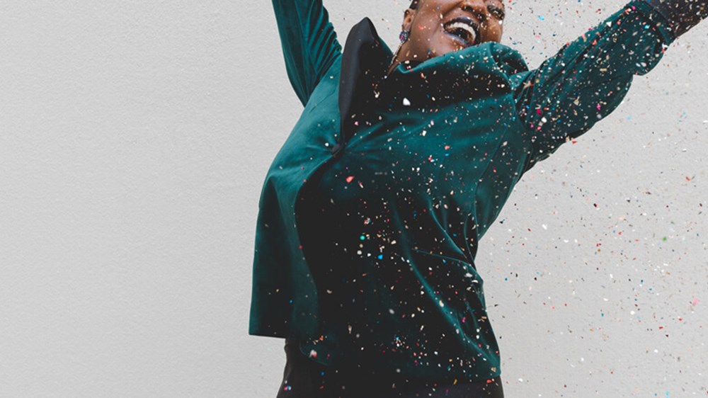 Happy woman jumping in the air | Wealthify