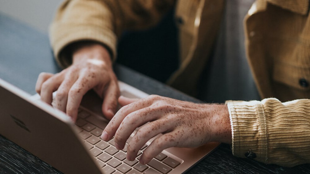 Man typing on his laptop | Wealthify