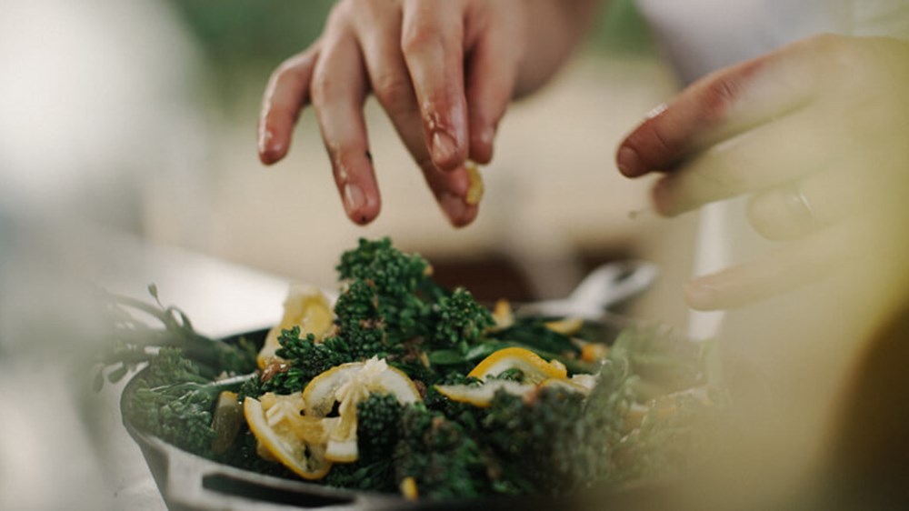 Person cooking meal | Wealthify