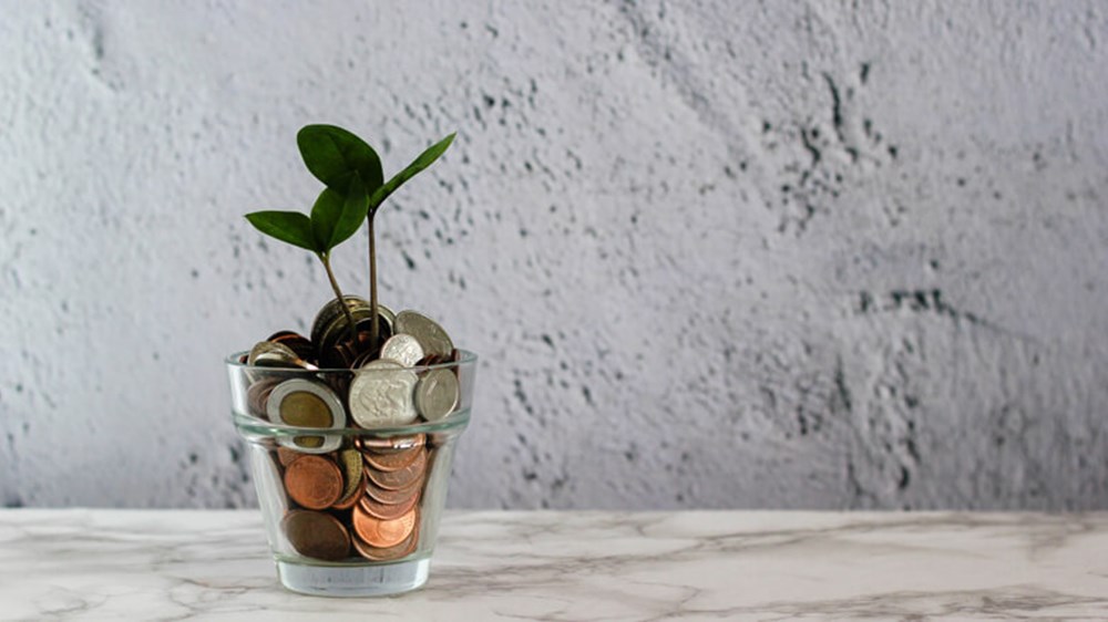 Jar with coins | Wealthify