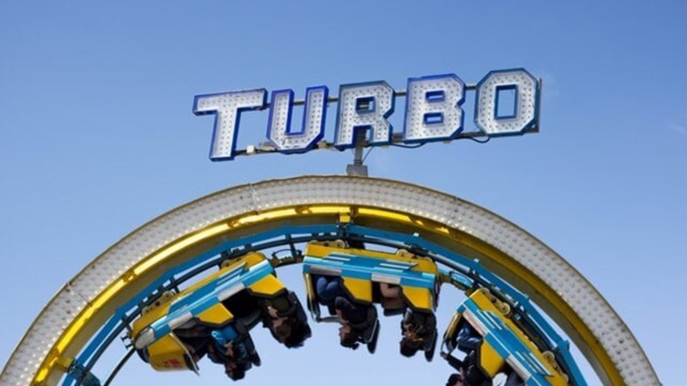 roller coaster with turbo sign | Wealthify.com