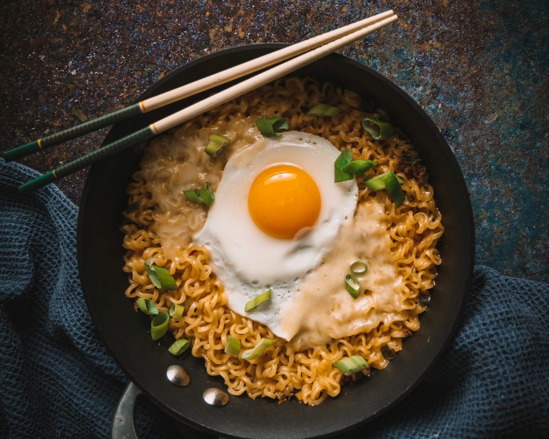 ramen noodles with egg and chopsticks | wealthify.com