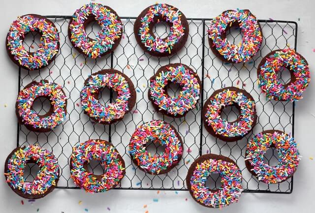 a dozen doughnuts with sprinkles | wealthify.com