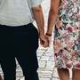 Close up of older couple holding hands
