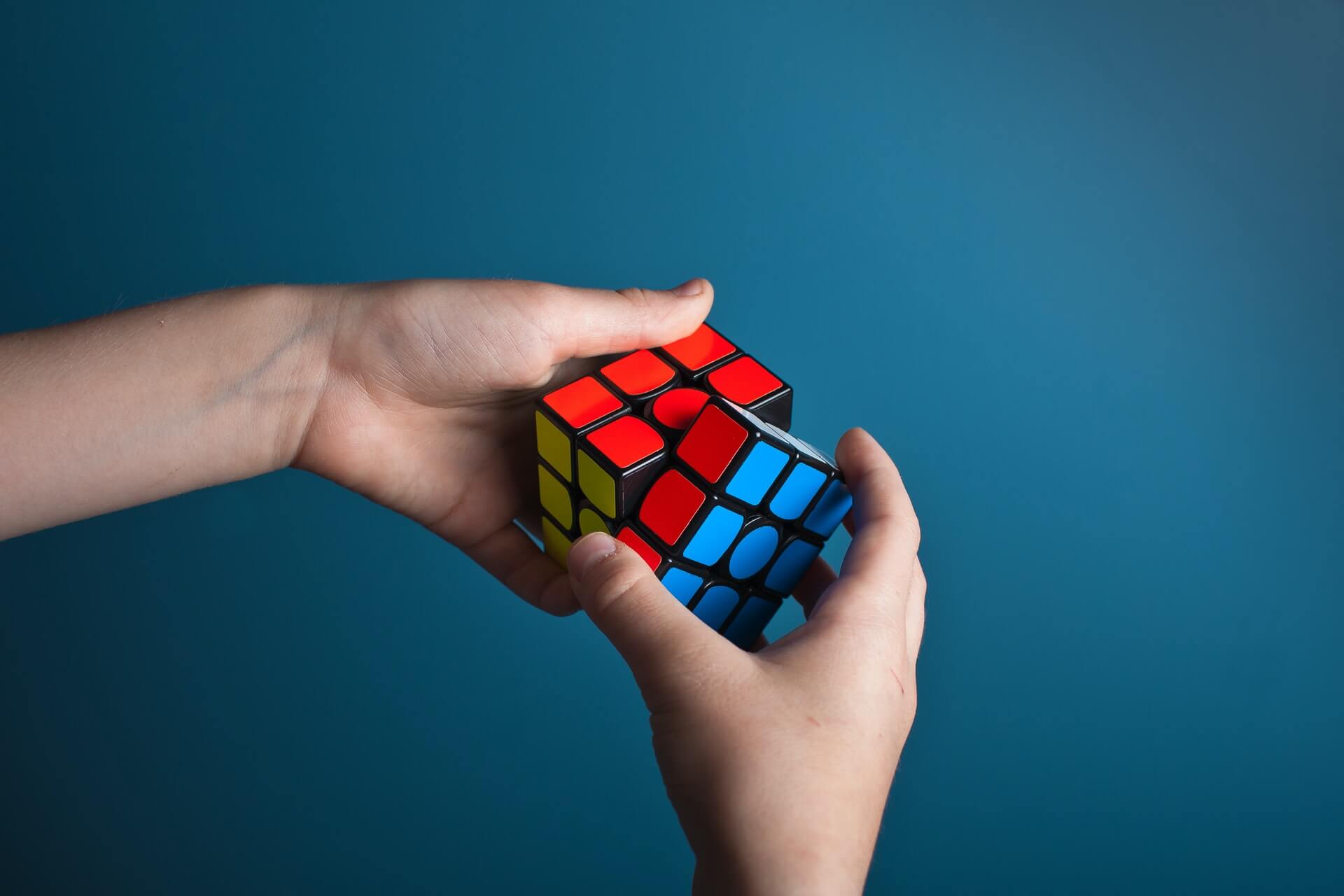 rubix cube on blue background | wealthify.com