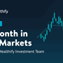 The text 'A month in the markets' written on a blue background
