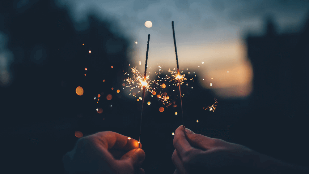 sparklers at night | wealthify.com